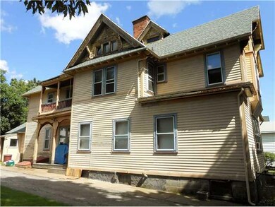 Exterior Front. Wood exterior is in need of paint.