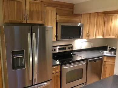  New Stainless Steal Appliances and Hickory Cabine