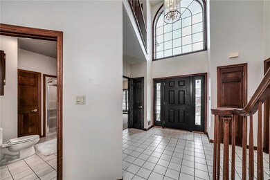 Grand, 2 story entry with ceramic tile and large w