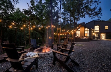 Patio terrace at dusk with an outdoor fire pit