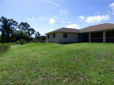 1243 Eclair St E, Lehigh Acres, FL 33974 - photo 4