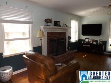 This living room is spacious with good natural lig