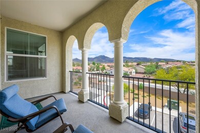 Balcony featuring a mountain view and a residentia