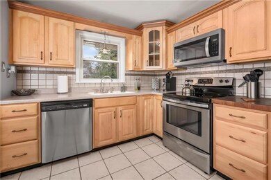 Kitchen w/SS appliances and Tile Backsplash