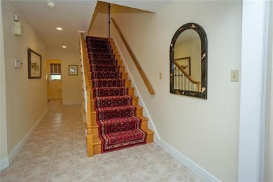 Welcoming Front Entry Staircase.