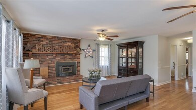 The beautiful brick fireplace is a show stopper