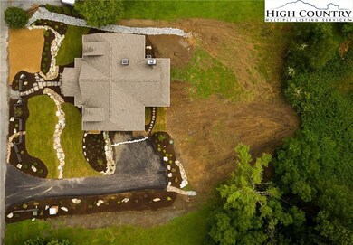 Landscaping and footprint thoughtfully built on 0.