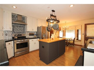 Recently updated island kitchen with enameled whit