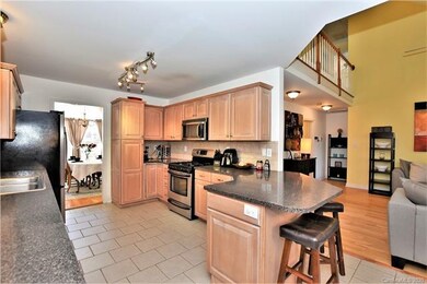 Breakfast Bar compliments this spacious kitchen