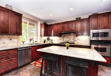 Home Chef kitchen with granite countertops, center