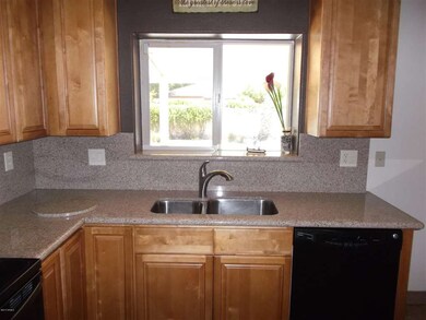 Oak wood cabinets and granite