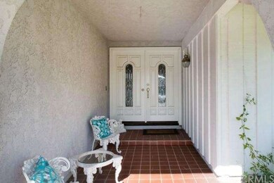 Covered Entry with Decorative Front Door