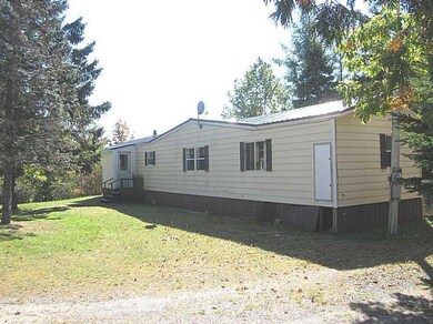 Exterior Front. Road side of home