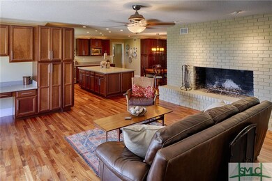 The kitchen and living room are spacious and warm.