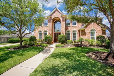 Attentive landscaping makes your approach to the regal double front doors a grand experience. What's your first impression? Windows, galore! Imagine the view from the inside!