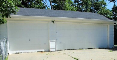 3 car detached garage.