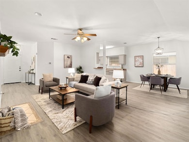 Living room featuring light wood finished floors,