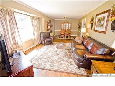 Huge living room with large picture window.