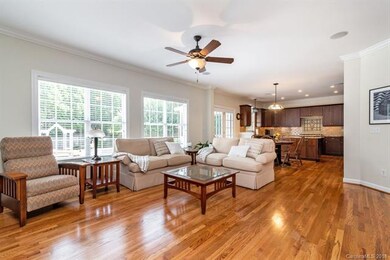 Spacious Den with Hardwood Floors.