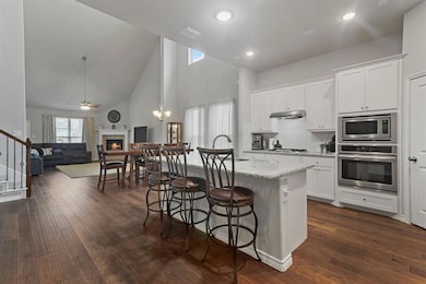View of oversized kitchen from front entry way