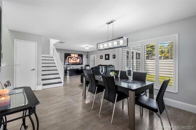 View of Dining Room and Living Room with Great Lar