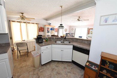 Kitchen to Dining Room, sliders to deck!