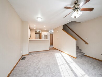 Open floor plan kitchen dinning living with firepl