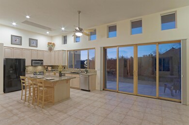 Kitchen with island and breakfast bar