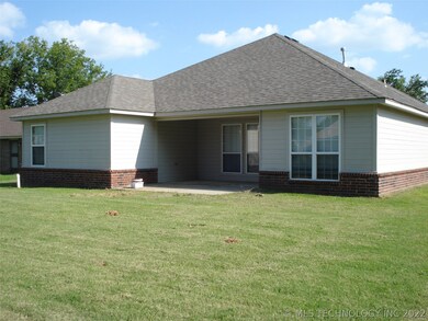 Back View of Home, Back Yard and Covered Porch