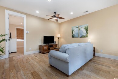 Living room featuring light hardwood / wood-style 