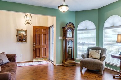 Formal living area off entry way.