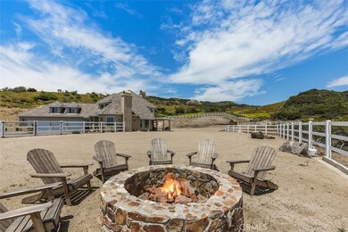 One of 3 flat areas that could be for anything, RV garage, workshop, guest house, horse pasture, Barn...