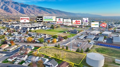 View of property location with a mountain backdrop and property boundaries highlighted