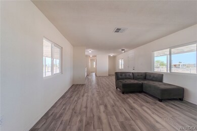 Unfurnished living room featuring plenty of natura