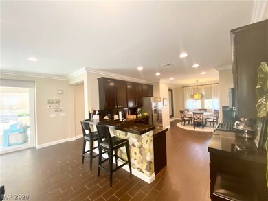 Large, upgraded kitchen with marble counters and b