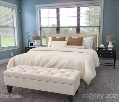 Virtual staged master bedroom.