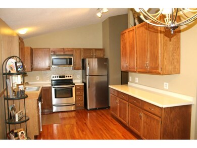 Large kitchen with vaulted ceilings and stainless 