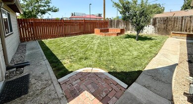 View of fenced backyard