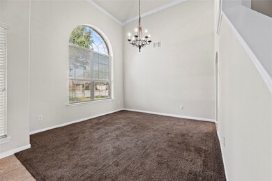 To the left of the entry is your formal dining spa