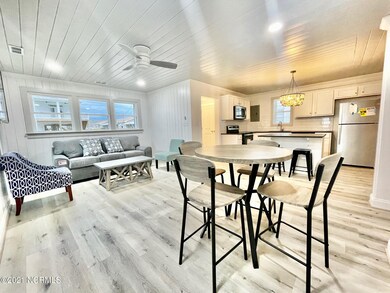 LIVING ROOM, DINING ROOM AND KITCHEN