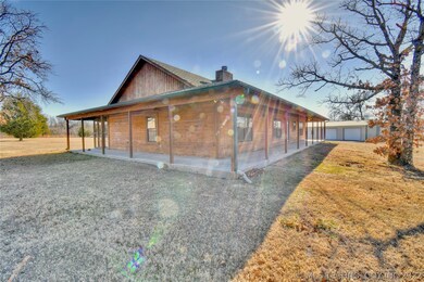 Toy barn features double garage doors for easy aut