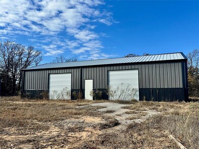 30x60x12 Shop Building with 3 large commercial doo