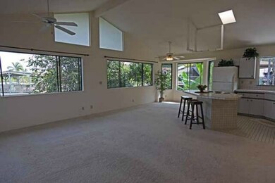 Living area looking at dining area... notice the nice high vaulted ceilings!