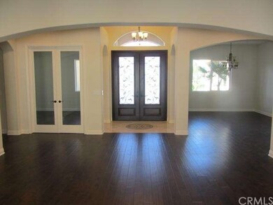 Formal Living looking into Dining Room (rt) and De
