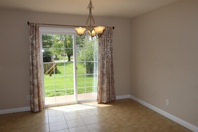 The dining room offers access to the patio in the 