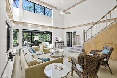 Spacious and bright 2-story living room with trans