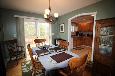 Dining room with arch ways and...