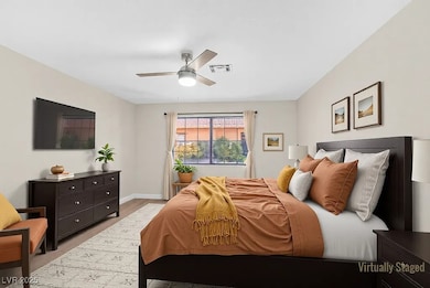 Bedroom featuring visible vents, ceiling fan, and