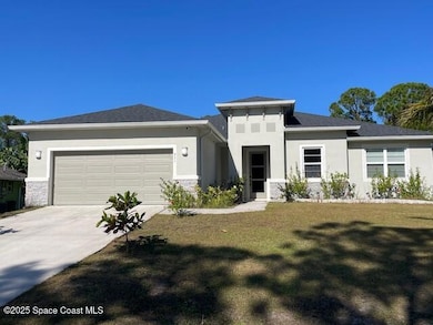 951 Sareta St SE, Palm Bay, FL 32909 - photo 2