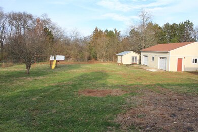 over 2 acres of land.property extends into the woods in the backgound